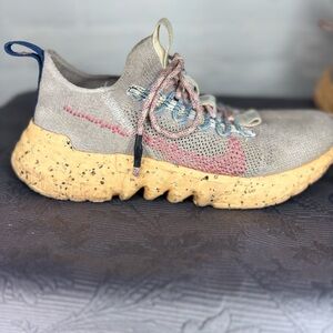 Nike Tan and Pink Sneakers with Mesh Upper and Cushioning Technology